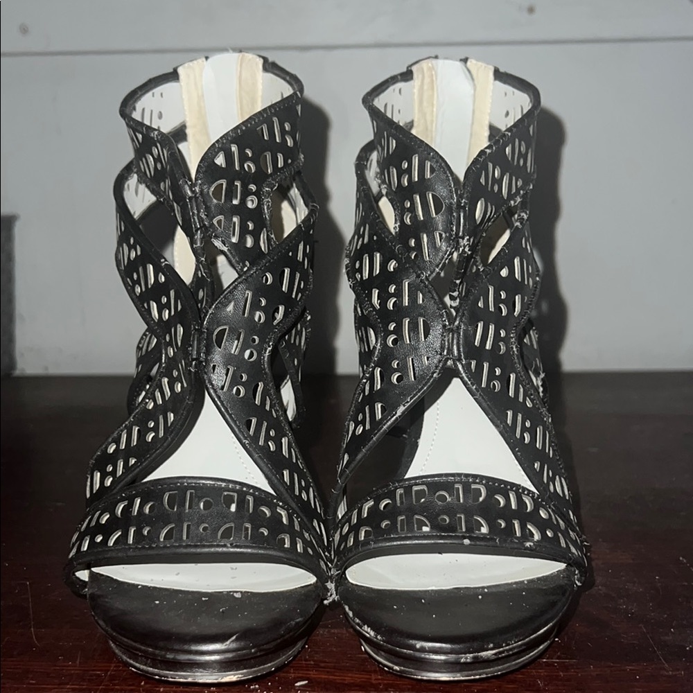 Calvin Klein Black with cut out designs on straps